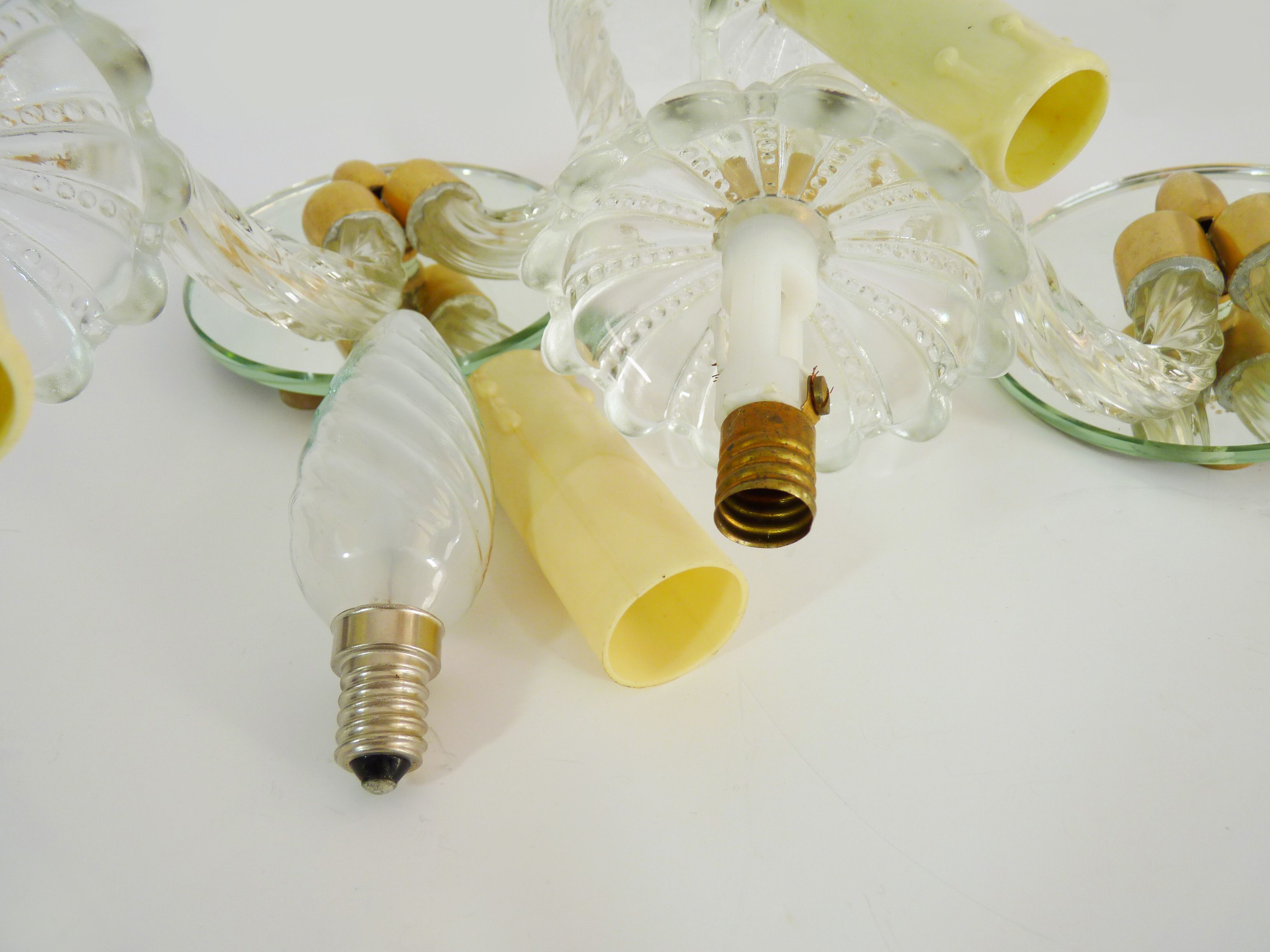 Magnificent pair of vintage wall sconces in glass and mirror, Murano style. Year 70