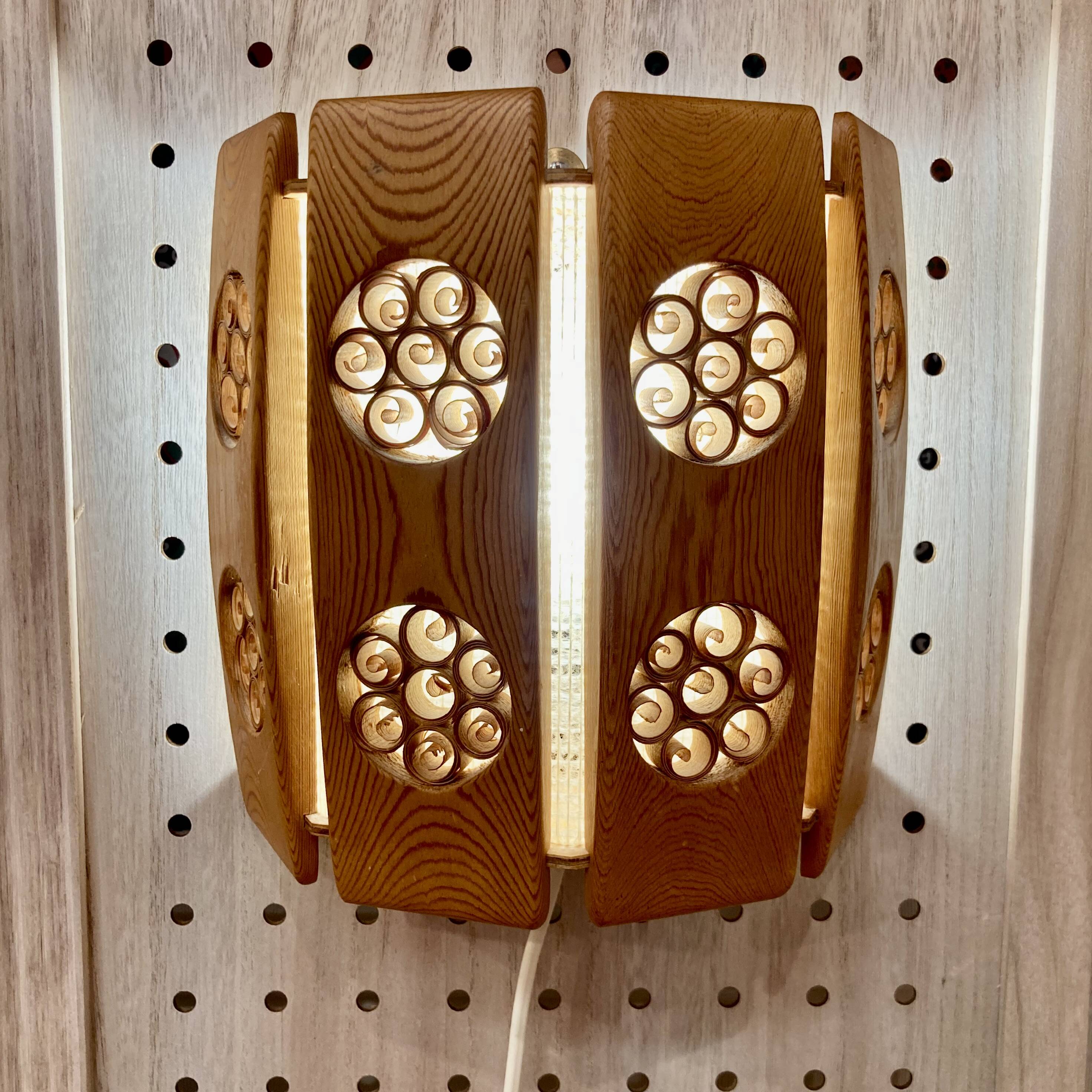 A pair of large scandinavian design wall lights from the 1950s.