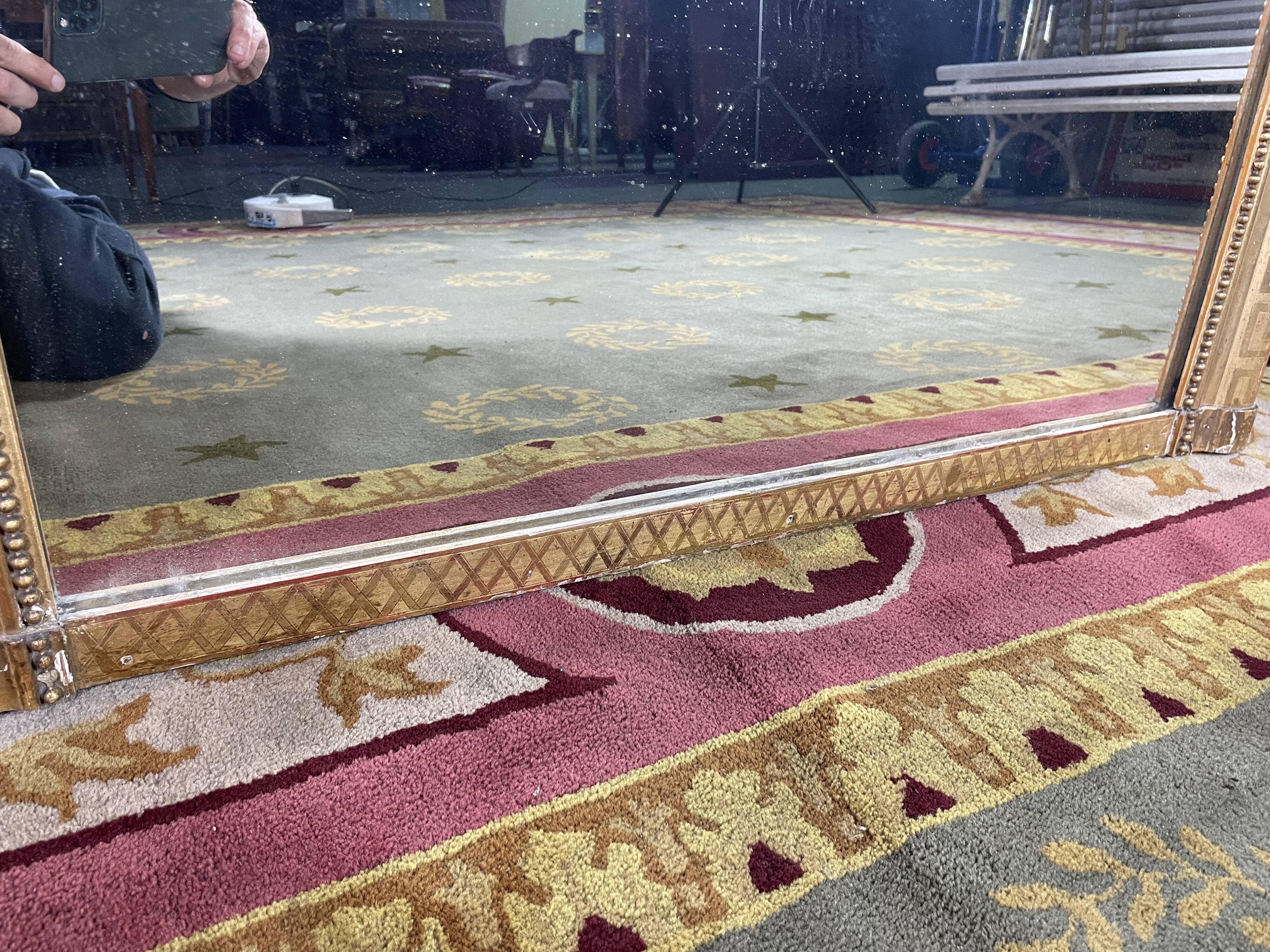 Louis Philippe period mirror with gold leaf