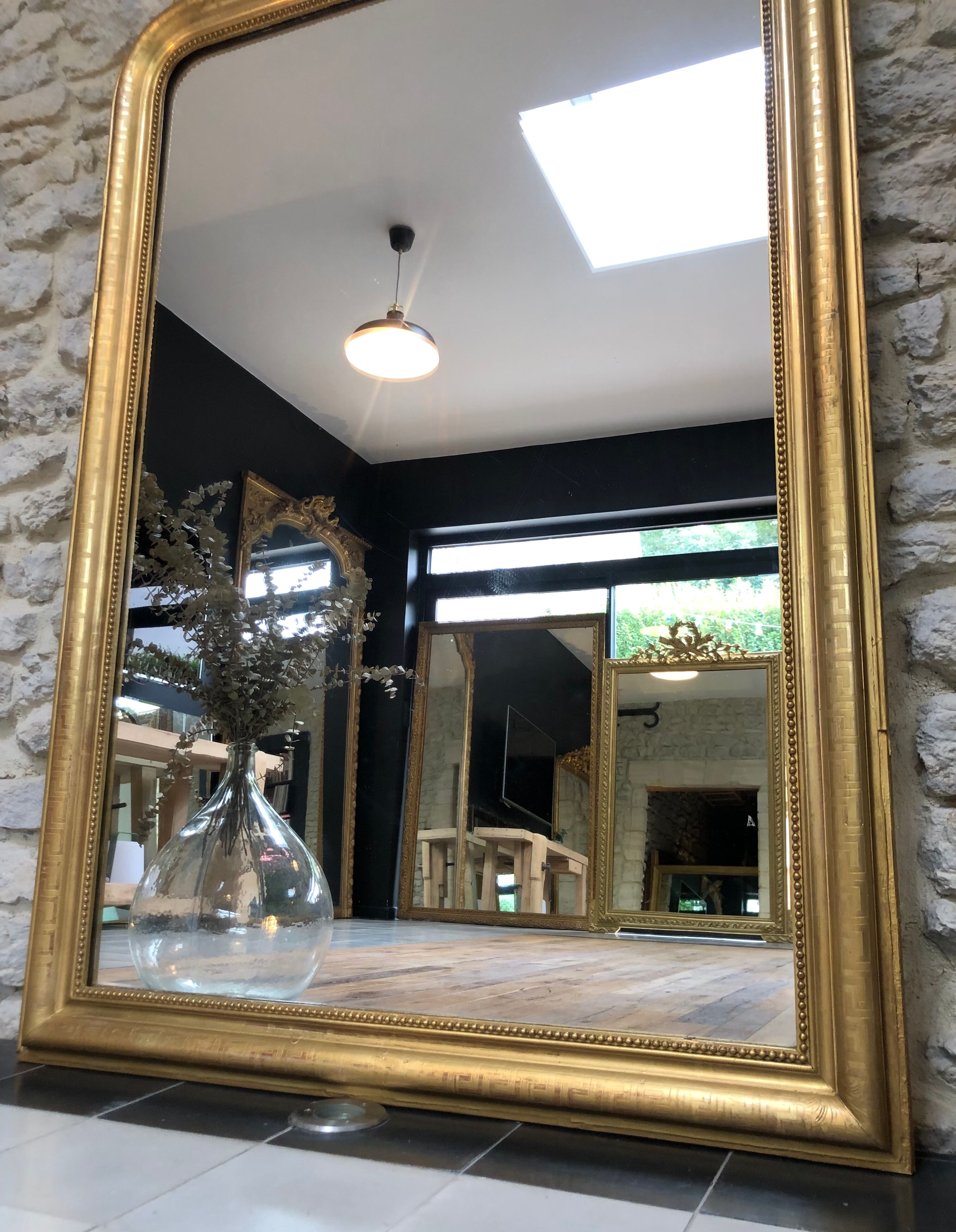 Louis-Philippe mirror pearled gold with gold leaf, some imperfections 146cm / 101cm