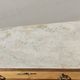 Old chest of drawers with white marble.
