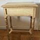 exotic wood console with a drawer
