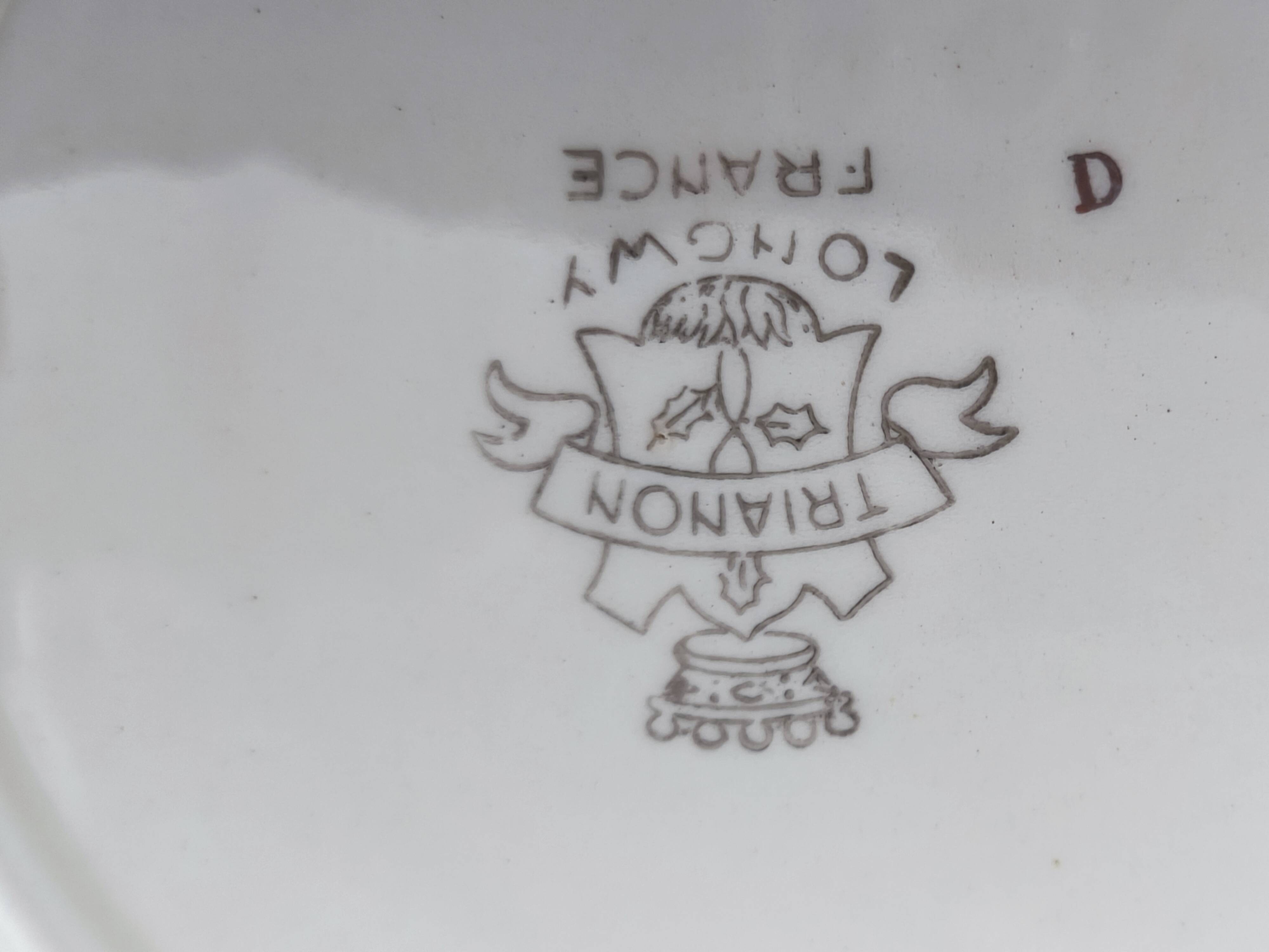 Set of 12 Longwy France earthenware soup plates, Trianon model