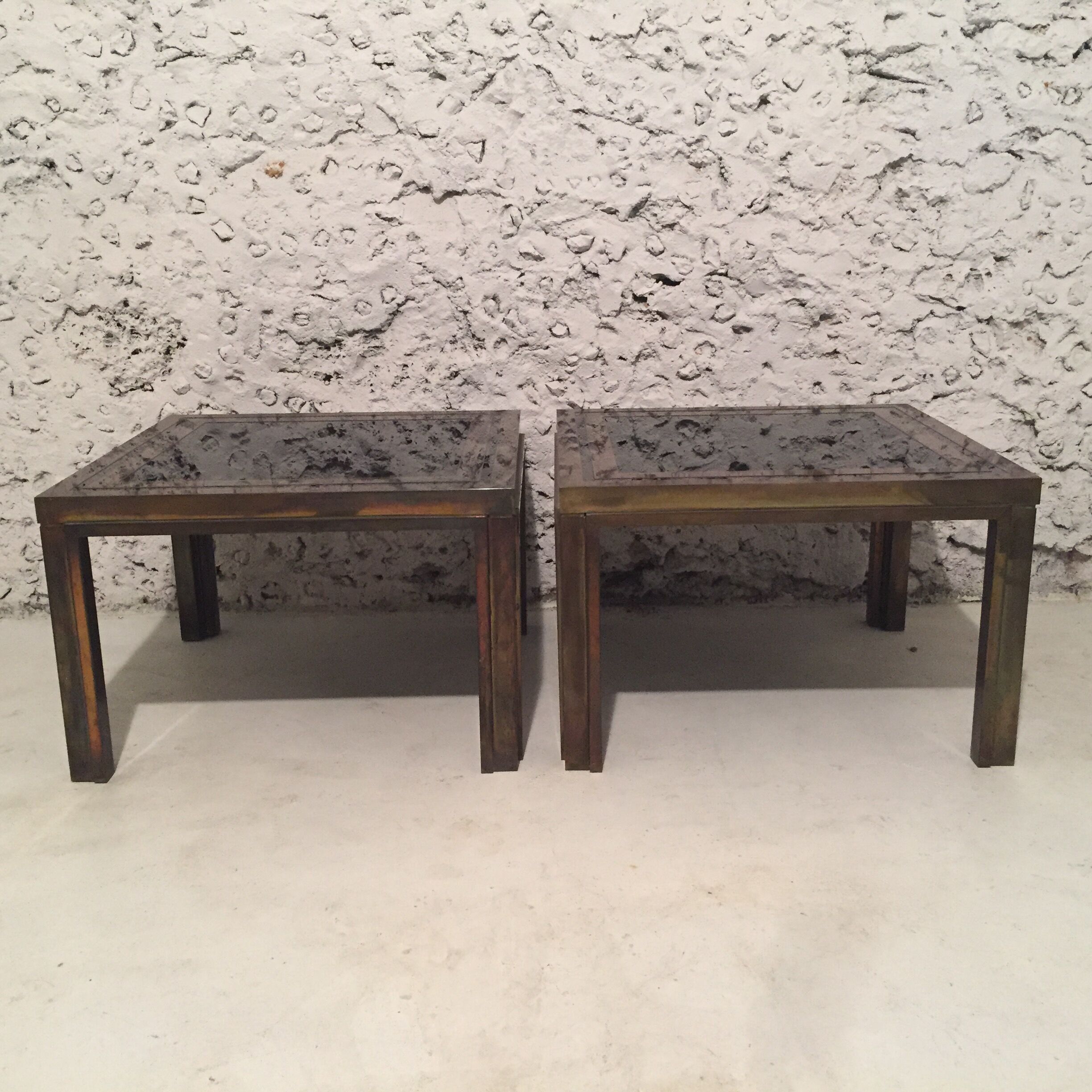 Pair of brass coffee tables and black mirror from the 70s