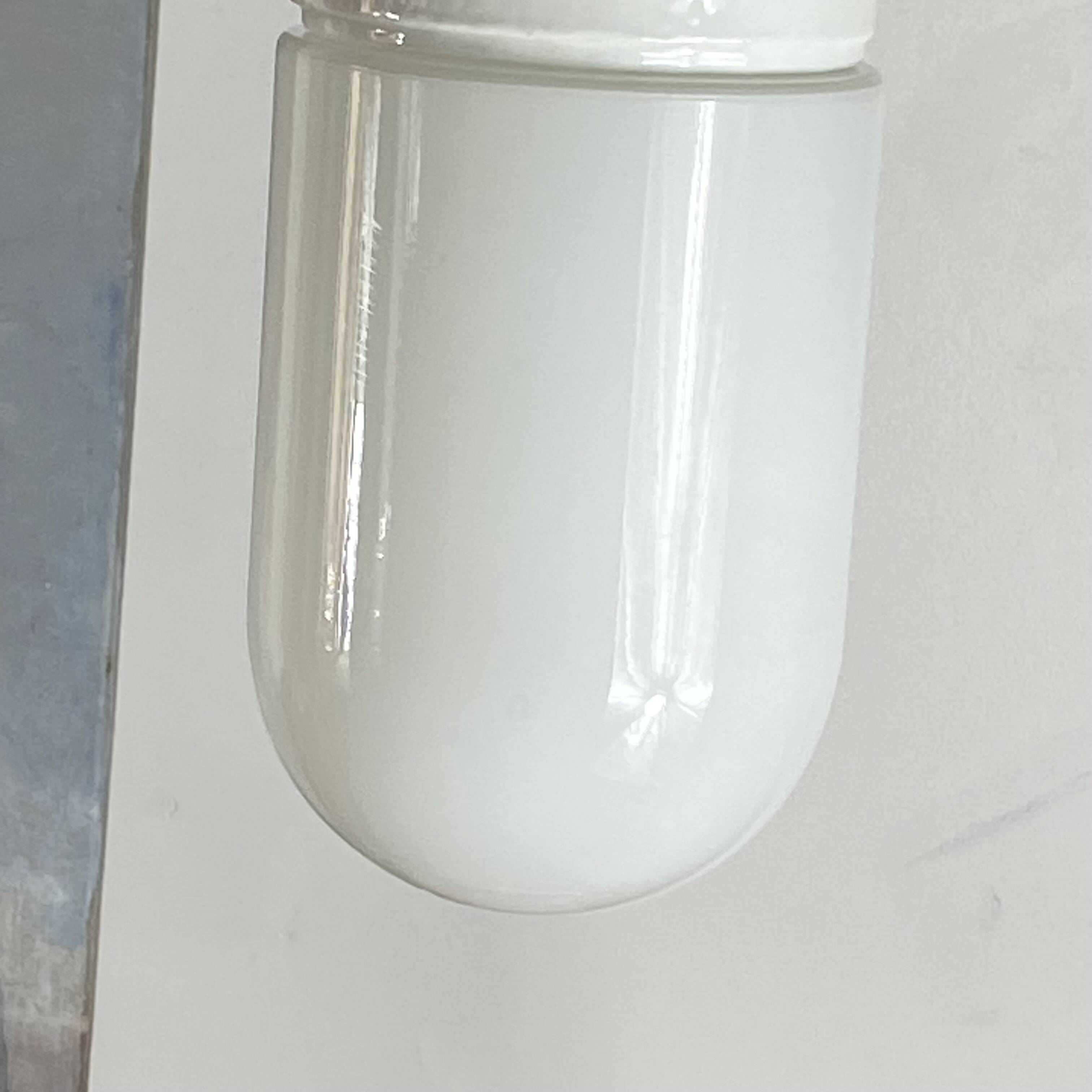 Industrial suspension in white glass and porcelain, vintage model.