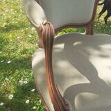 Pair of Rocaille style armchairs in green fabric and walnut, 19th century