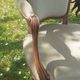 Pair of Rocaille style armchairs in green fabric and walnut, 19th century
