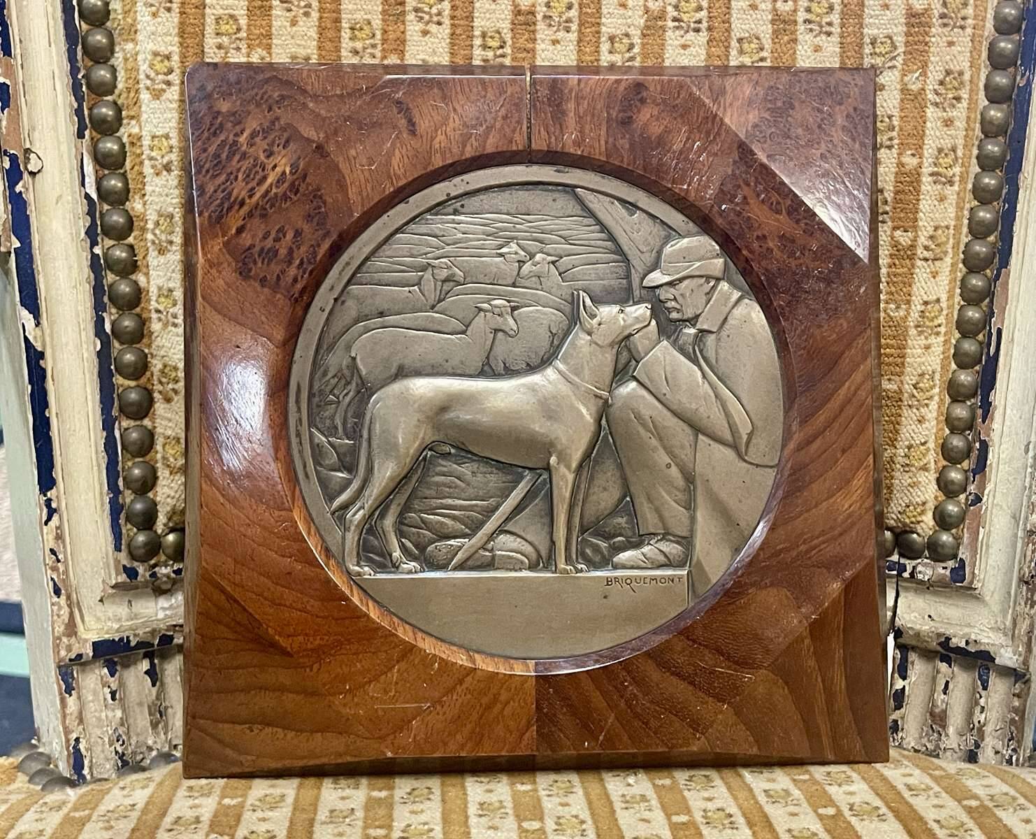 Bronze bas-relief framed in wood signed by Jean Auguste Briquemont (1879-1951)