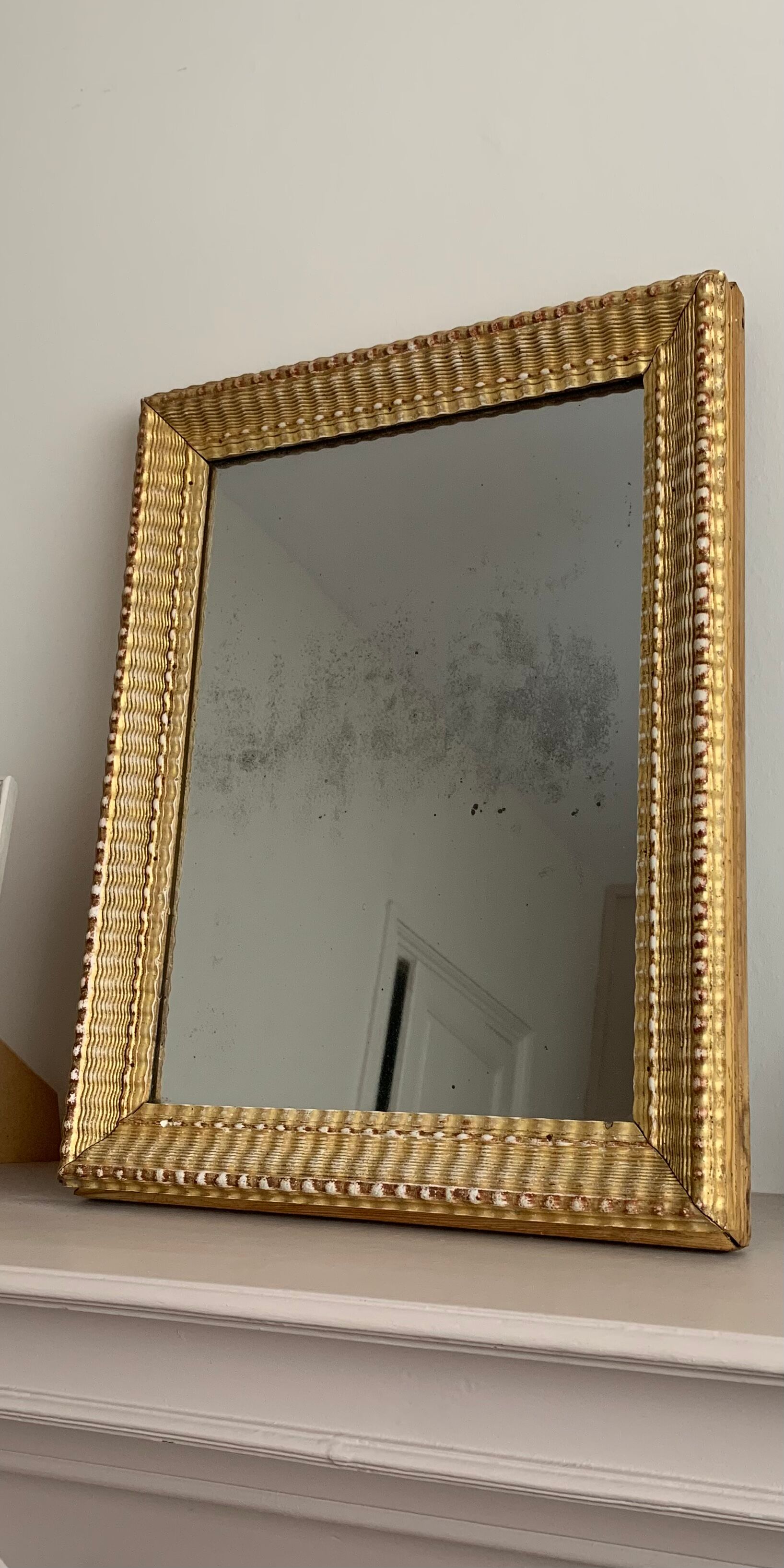 Carved and gilded wooden mirror  44x56cm