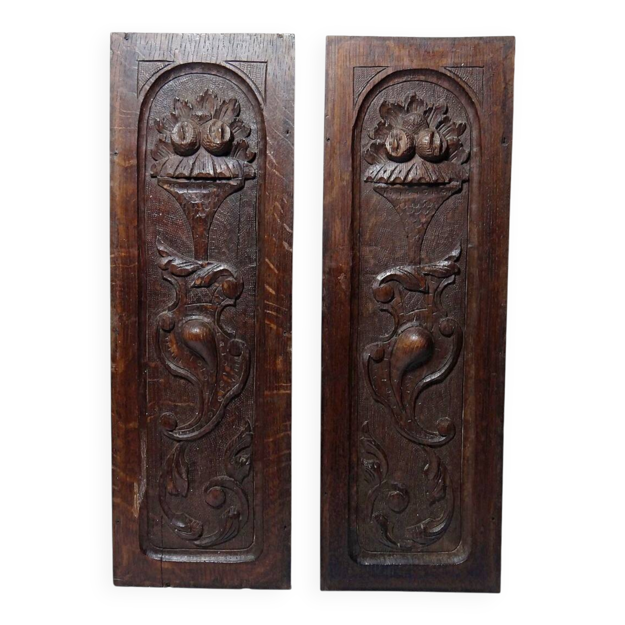 Pair of decorative wall panels in carved wood from the 19th century.