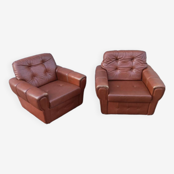 Pair of vintage brown leather armchairs