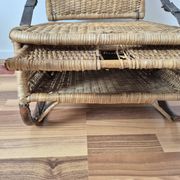 Vintage foldable beach chair, picnic in rattan and leather.