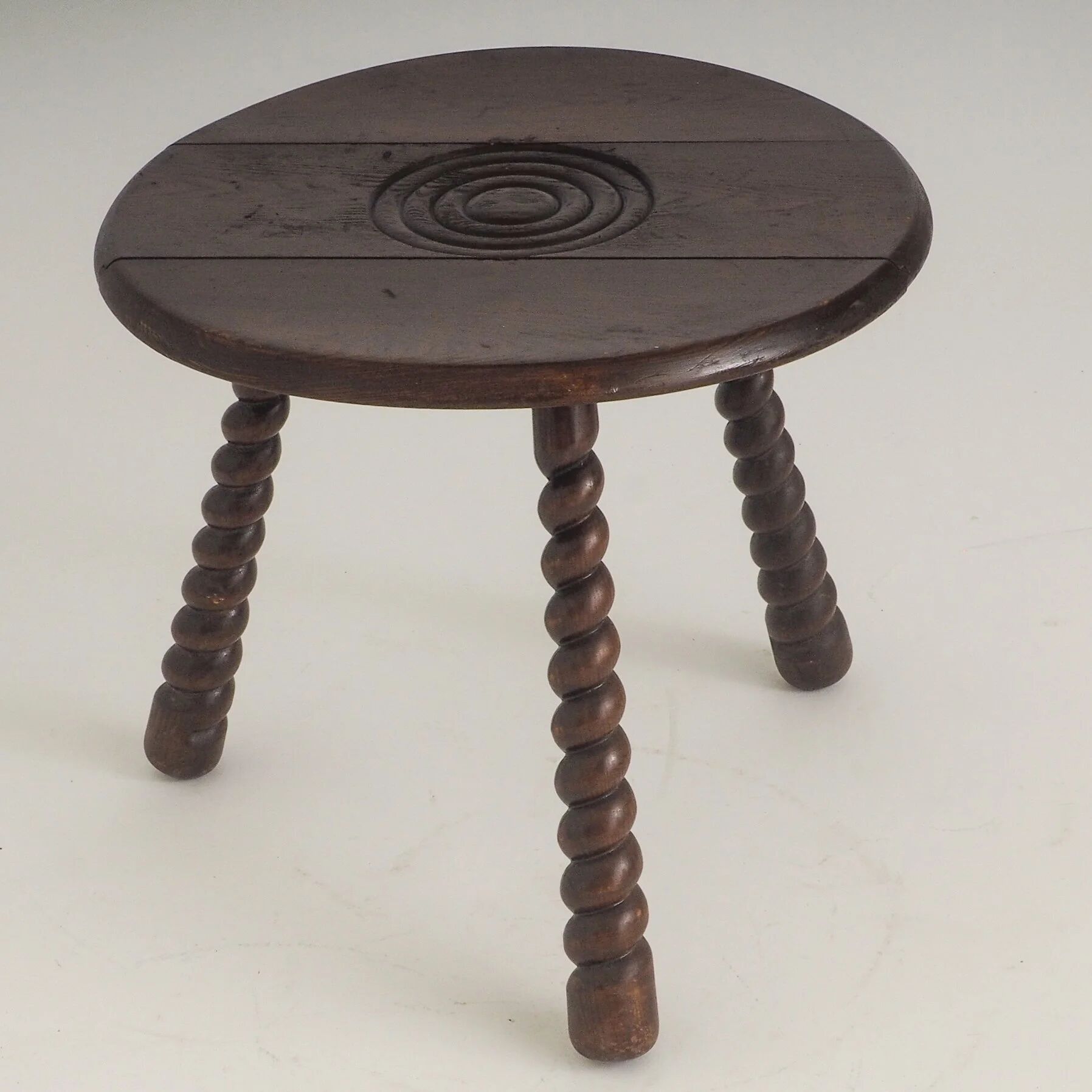 French oak tripod side table attributed to Charles Dudouyt