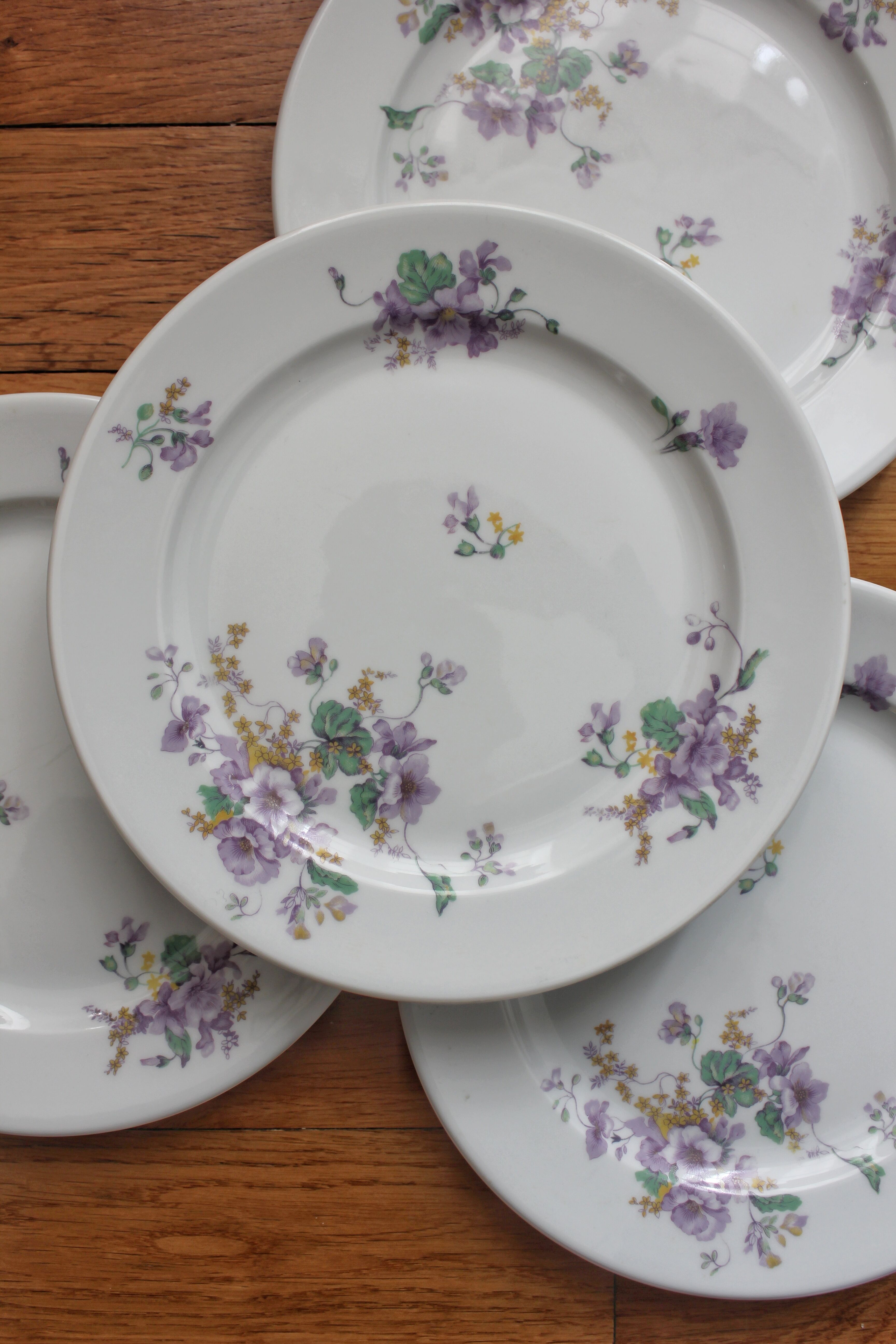 4 porcelain dessert plates decorated with flowers Bernardaud Limoges