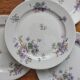4 porcelain dessert plates decorated with flowers Bernardaud Limoges