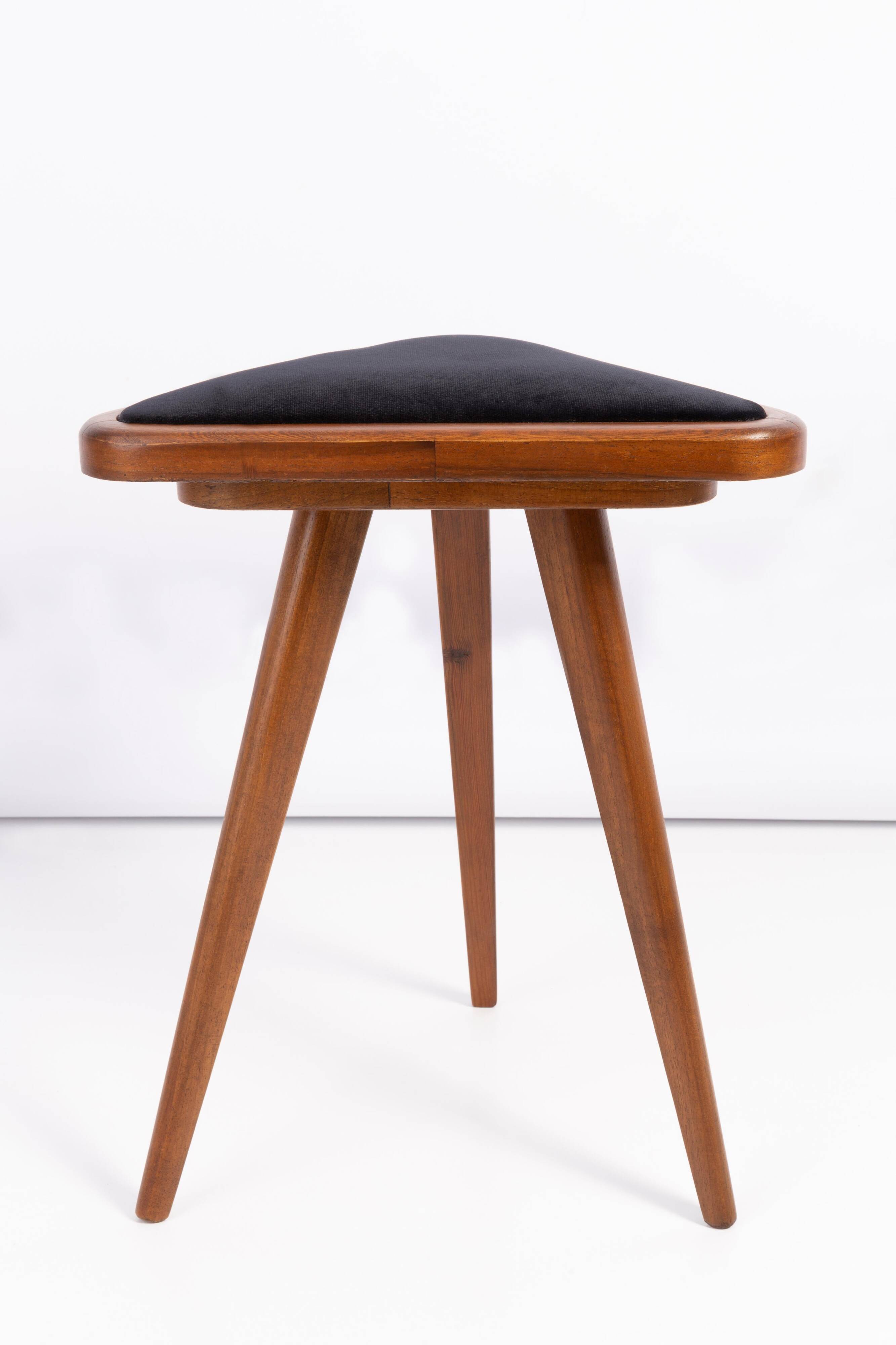 Set of two triangular stools in black and white velvet, Europe, 1960s.