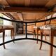 Extendable table in cherry wood with wrought iron legs.