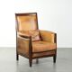 Cognac-coloured Art Deco design armchair made of sheepskin with a high back