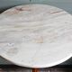Turned solid wood side table stained with a quartz top.