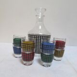 Decanter and eight glasses year 50