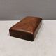 Wooden trinket box for storing jewellery, cigarettes or similar items.