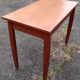 Teak veneer desk, curved feet