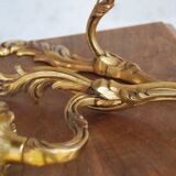 Pair of Louis XV style sconces in bronze with 1 arm of light