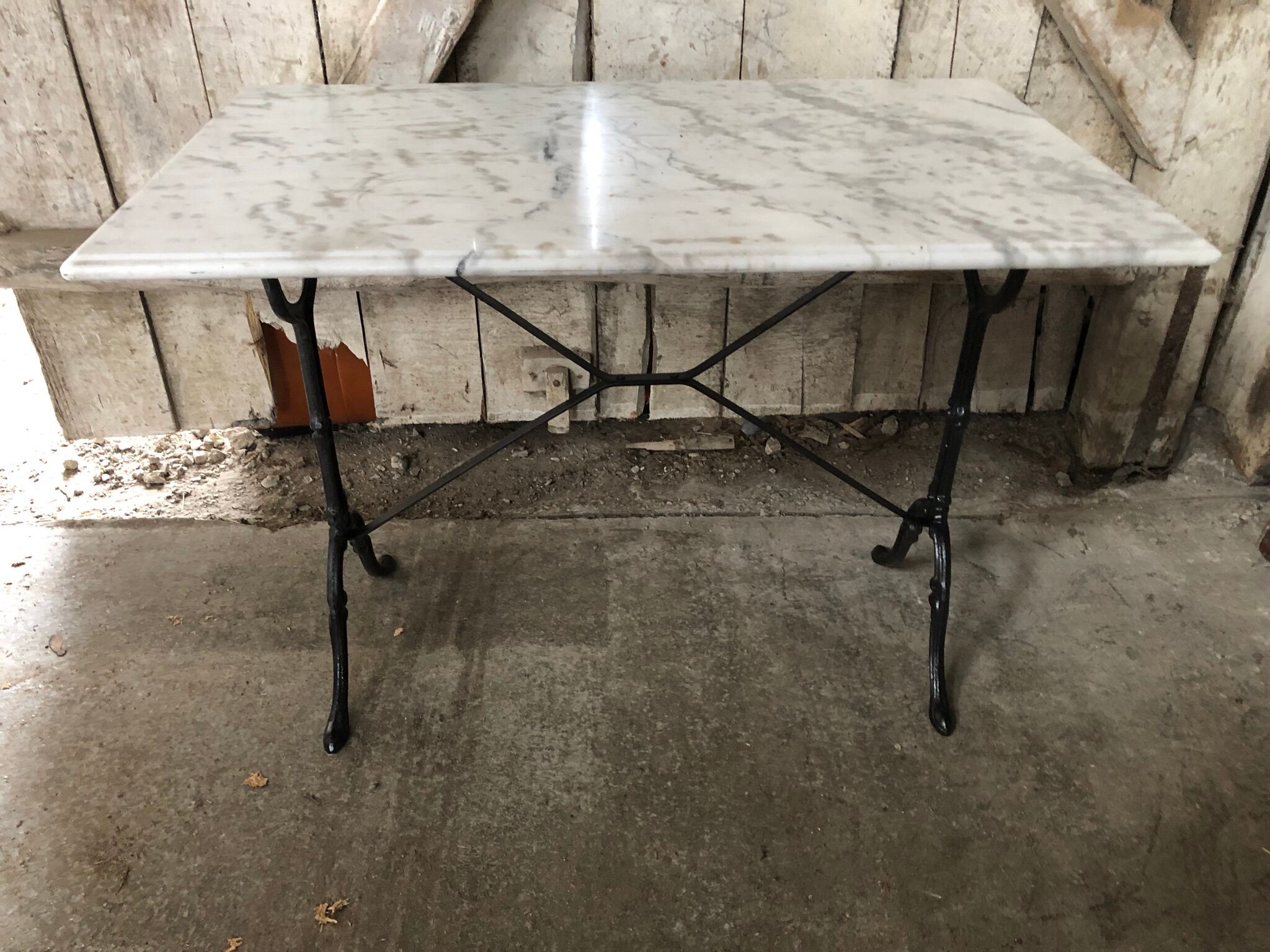 Old bistro table pied fer wrought black + white marble top vintage