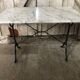 Old bistro table pied fer wrought black + white marble top vintage