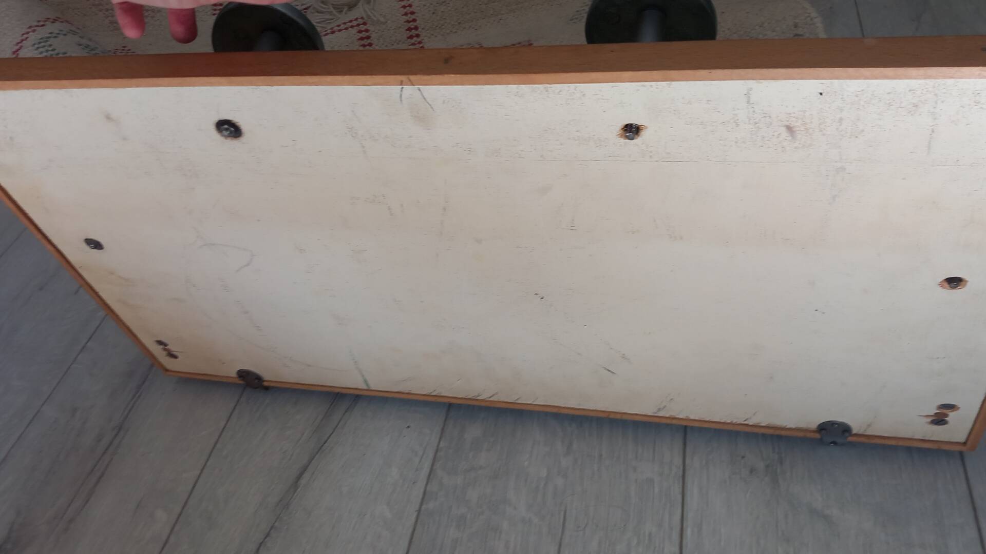 1950s coat rack with mirror, metal hooks, and glass shelf.