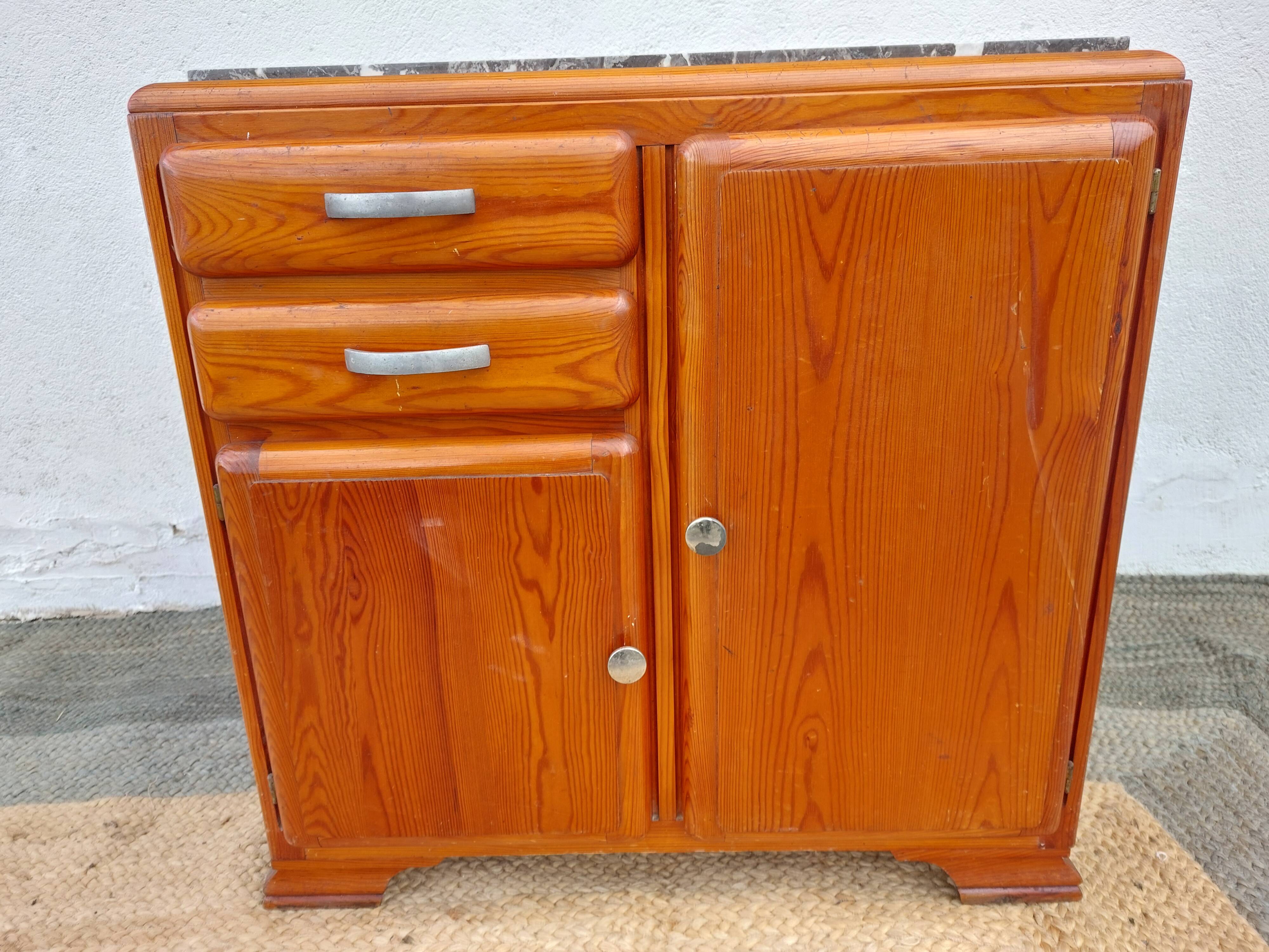 Mado buffet, marble top and asymmetrical doors.