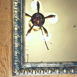 Old mercury mirror, in carved wood with silver leaf.