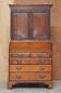 George III oak secretary bookcase circa 1760, Thomas Chippendale style.