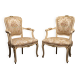 Pair of Louis XV style armchairs – Carved, gilded wood and brocade fabric