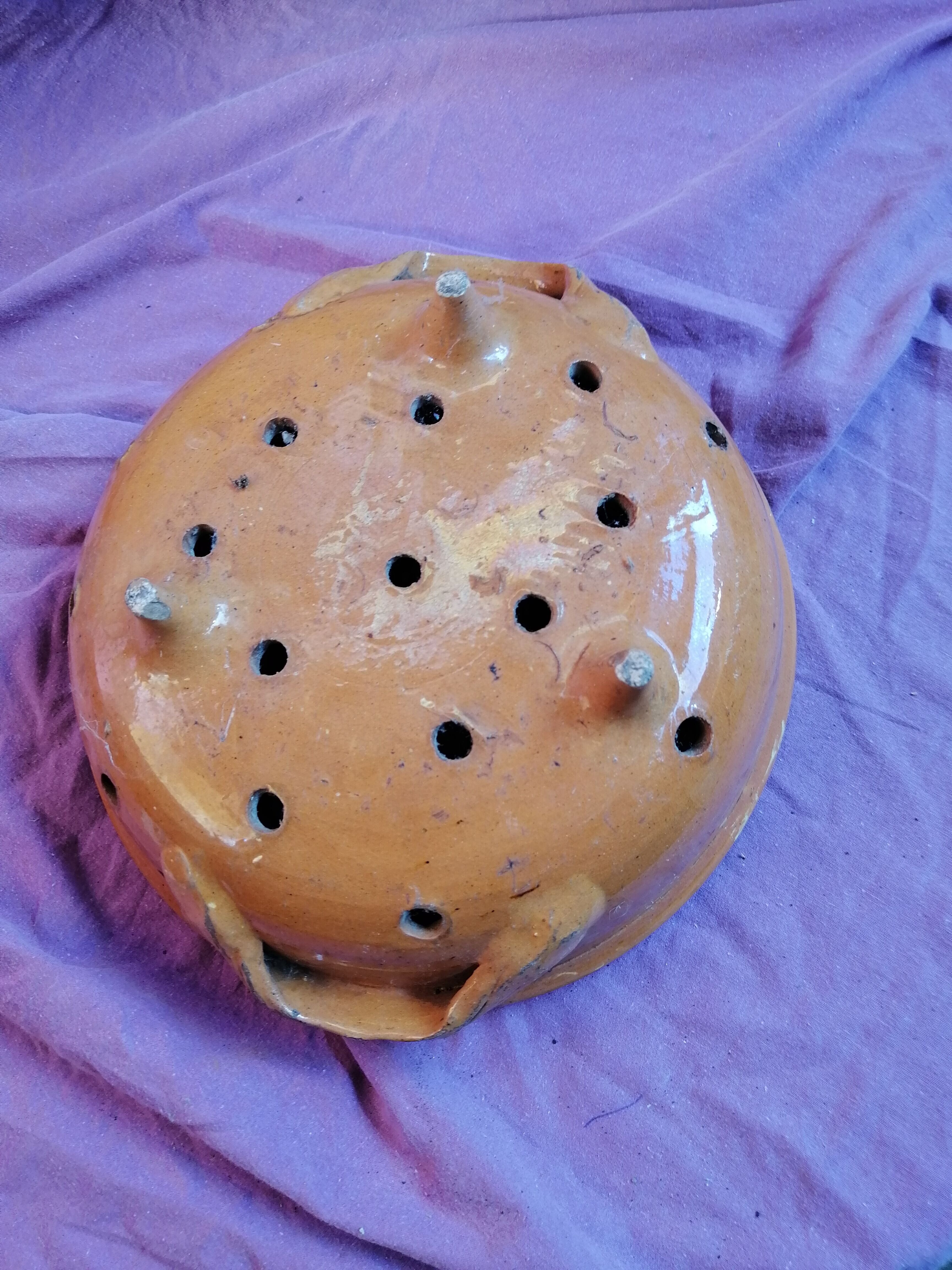 Old dish drainer in mud