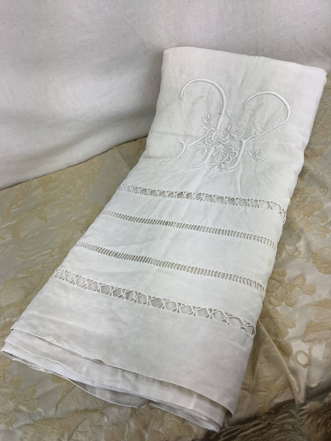 Old linen sheet with monogram embroidery