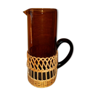 Vintage colored glass pitcher in Brown and braided Wicker dressing