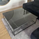Coffee table with ceramic top and wrought iron base