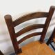 Set of 4 vintage brutalist chairs by Georges Robert in wood and straw.