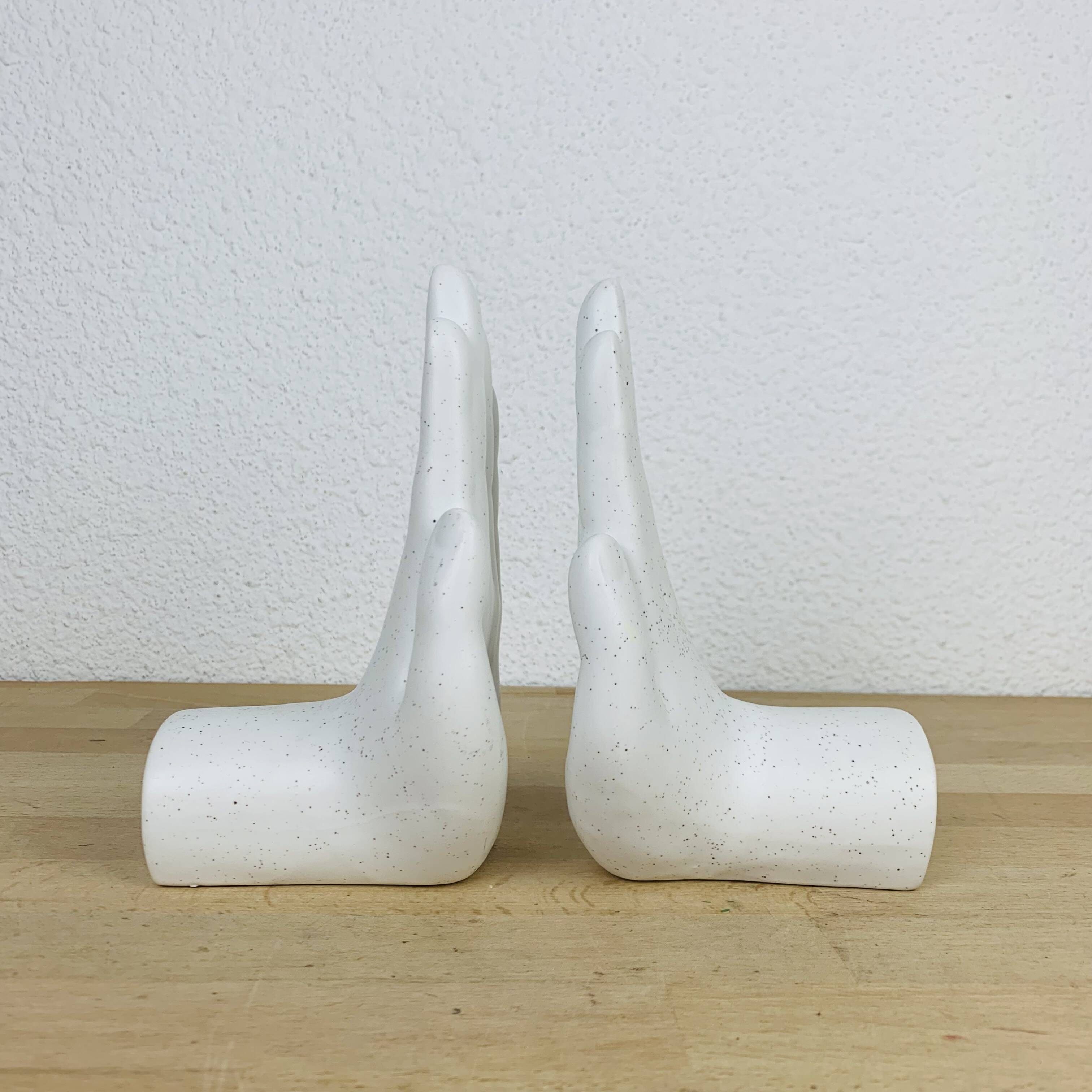 Pair of white ceramic hand bookends