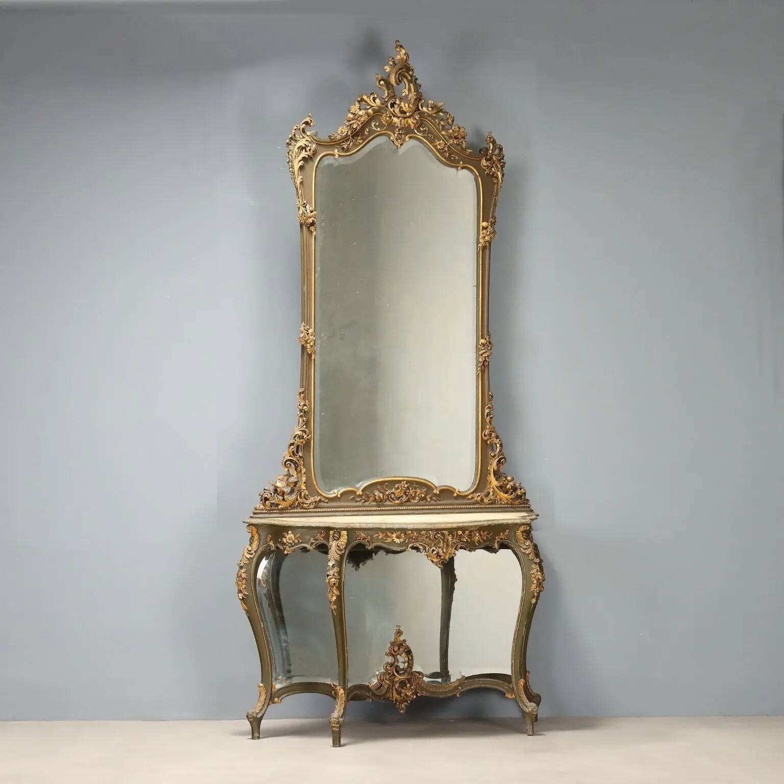 Ancient baroque console with a wooden mirror, Italy, late 19th century.