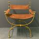 Fauteuil curule romain années 40, art deco cuir et laiton