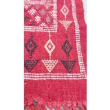 Red hand-woven carpet in pure wool