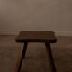Vintage wooden stool in organic shape