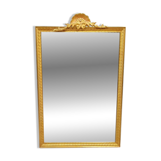 Louis XV - Louis XVI style mirror in gilded brass