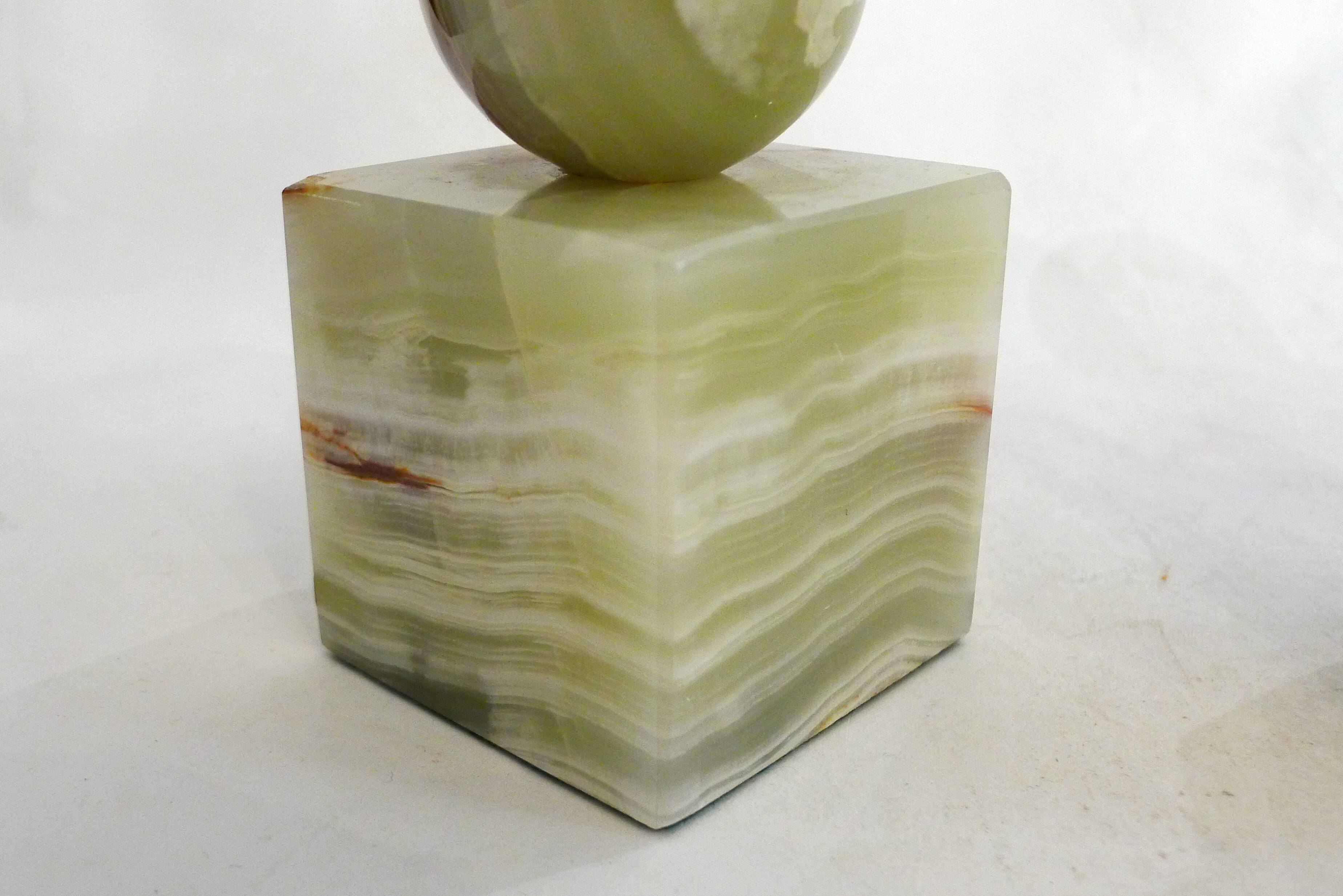 Pair of sculptural mid-century bookends in Onyx, Italy.