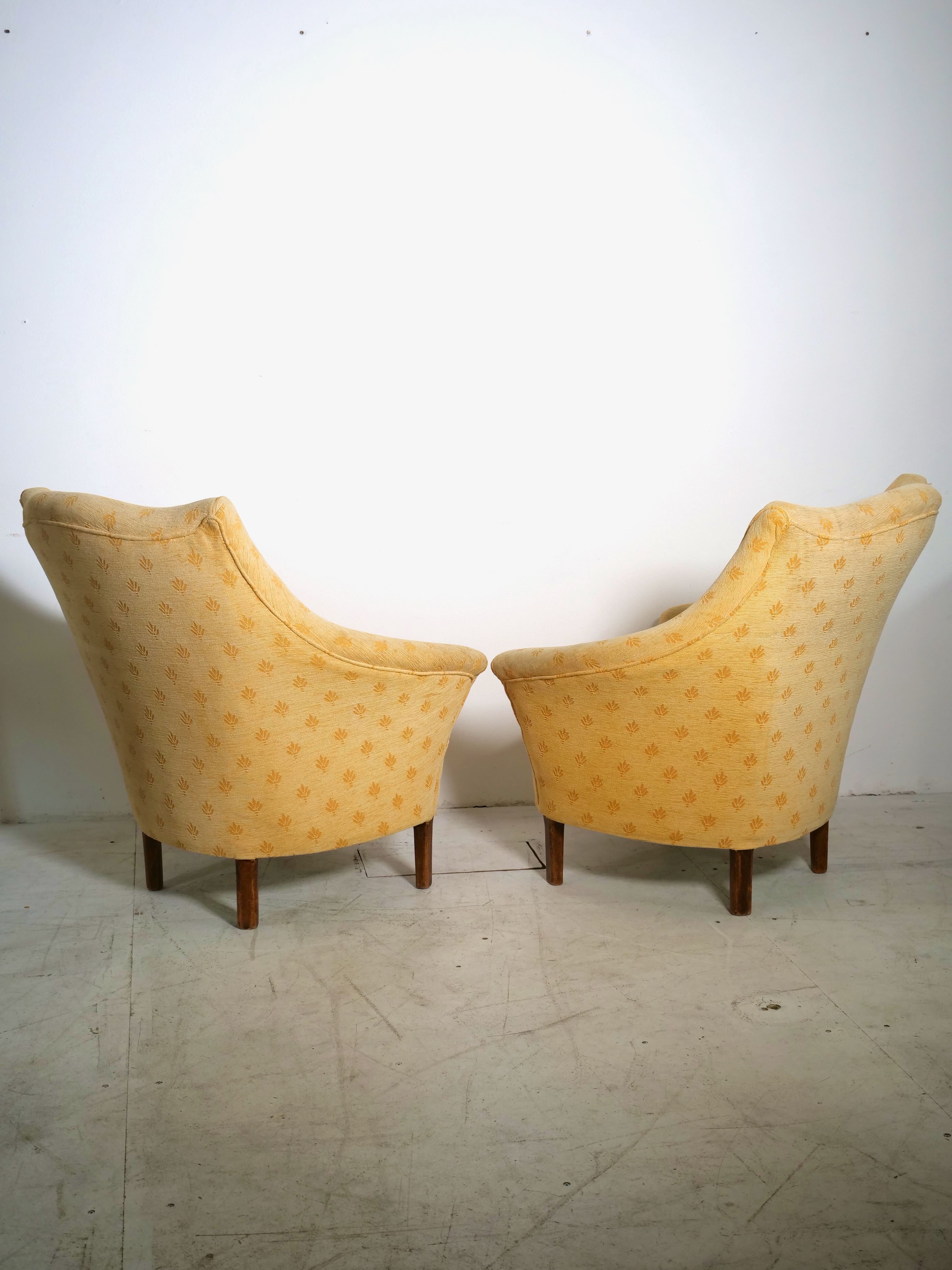 Pair of yellow vintage armchairs