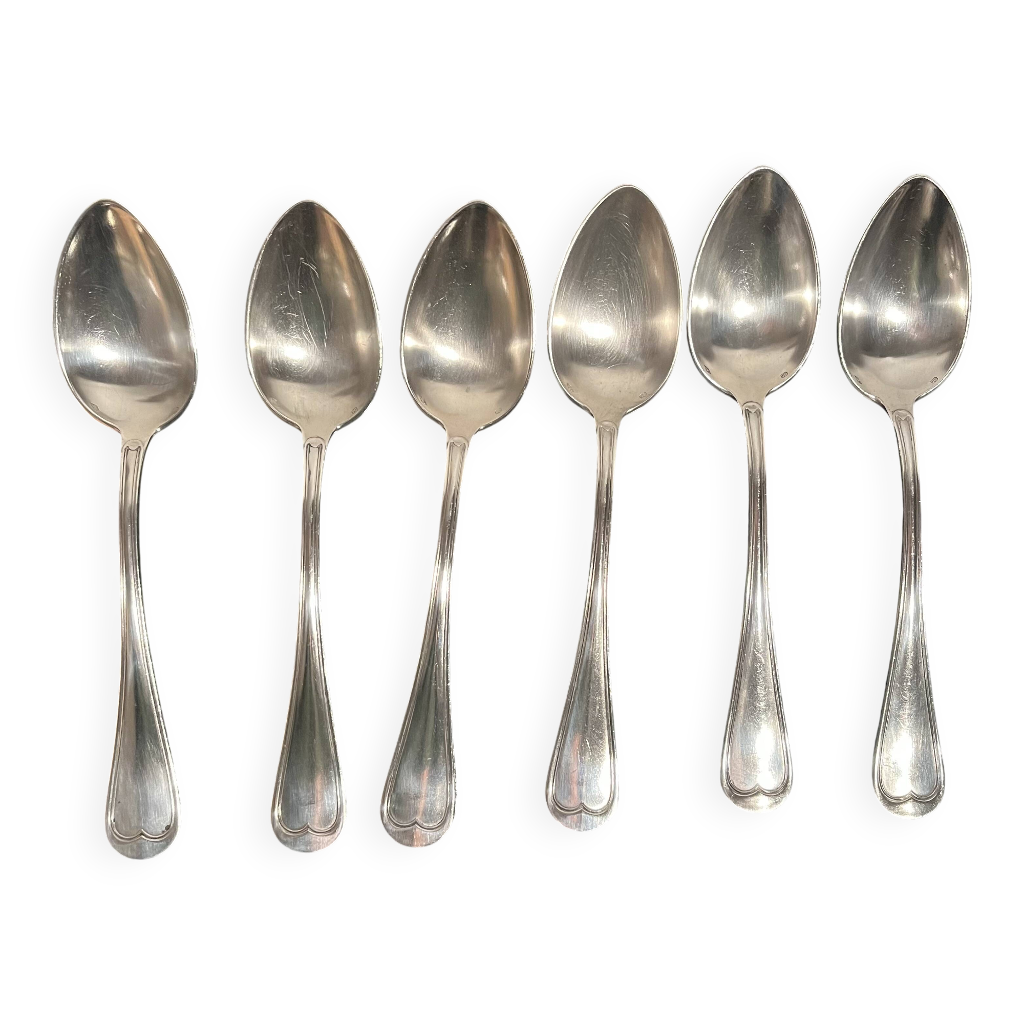 Silver-plated metal soup spoons