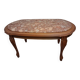 Coffee table with a stone top.