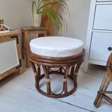 Rattan and boucle fabric pouf